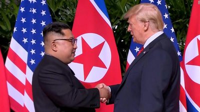 180611204213-02-trump-kim-handshake-0611-screengrab-super-tease.jpg