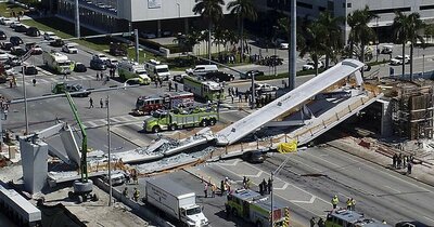 180315-miami-bridge-collapse-se-448p_da36472007ca8cf44852e111bb41387f.nbcnews-fp-1200-630.thumb.jpg.218039c334a2d9a10b5064b1b05b41a1.jpg