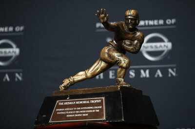 HEISMAN.thumb.jpg.19db6c91ca1d07321ea71d55fdad934a.jpg